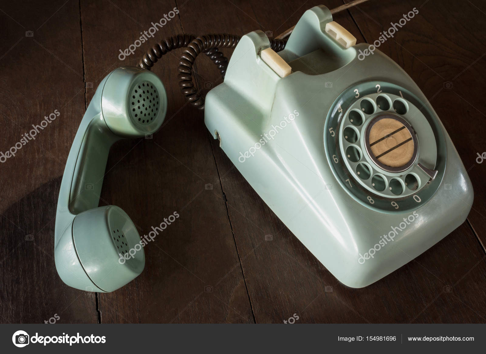 Old Green Vintage Telephone Phone Land Or Landline With Dust On Old Green Vintage Telephone Phone Land Or Landline With Dust On Wooden Retro Desk Copy Space For Text