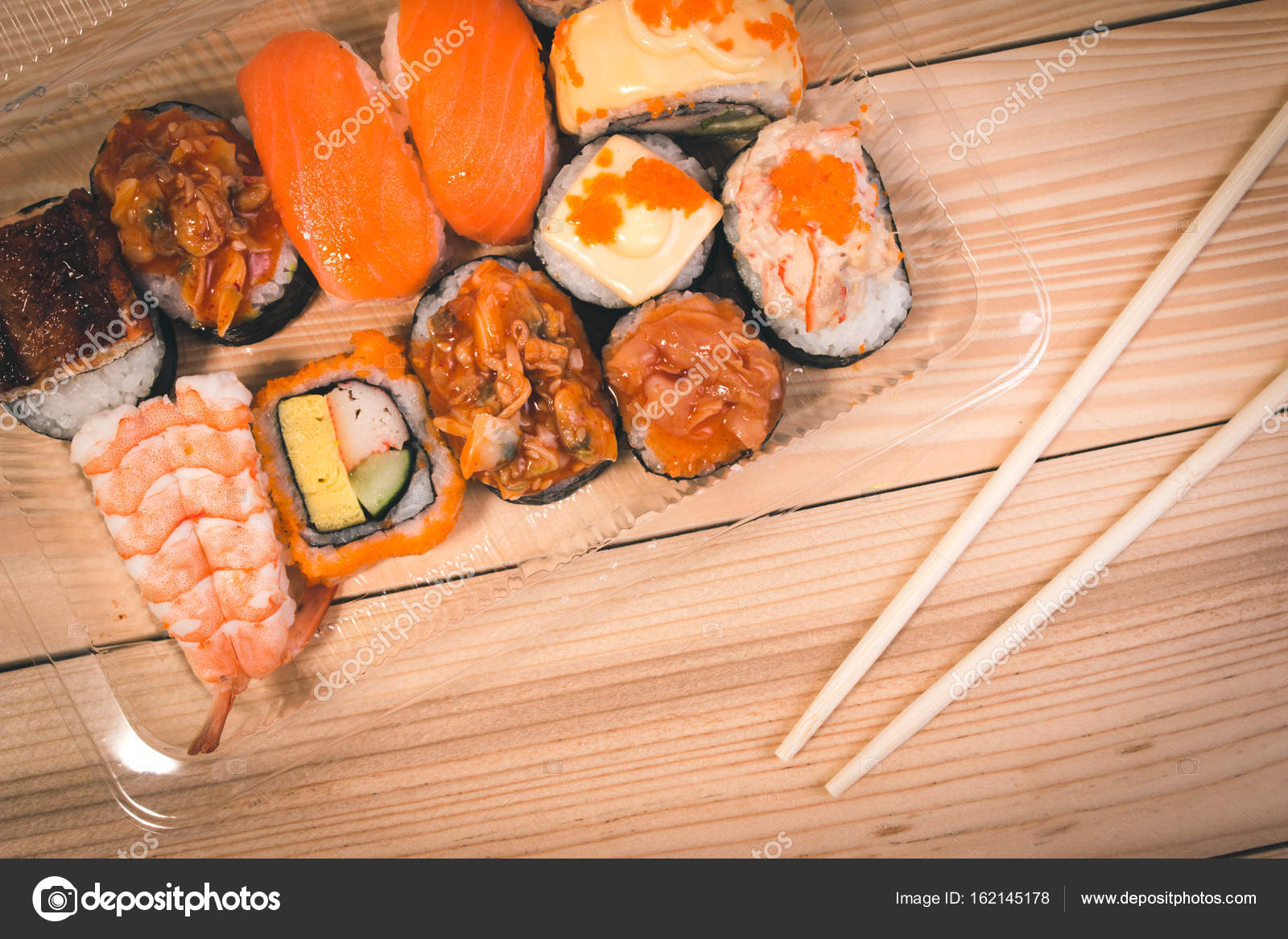 Japanese food Sushi in plastic box on Japanese table. Set of Sushi ... Japanese food Sushi in plastic box on Japanese table. Set of Sushi ...