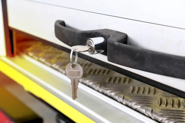 Close up of key at car door or truck door. Key car insert to key door with copy space.