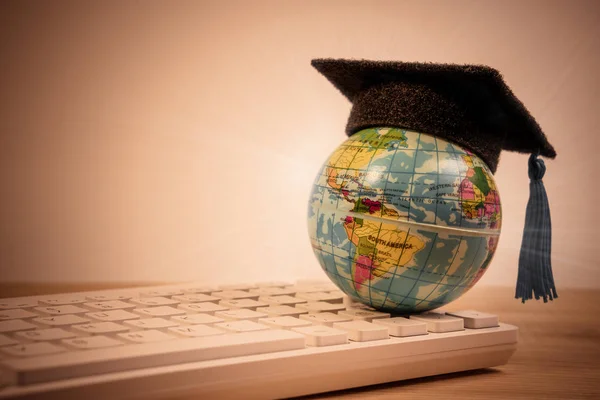 Graduation Cap Top Earth Globe Model Map Computer Keyboard Background — 스톡 사진