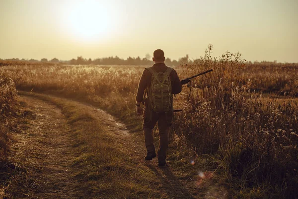 Young Hunter Checkered Shirt Military Backpack Gun His Hands Walking — Stock Photo, Image