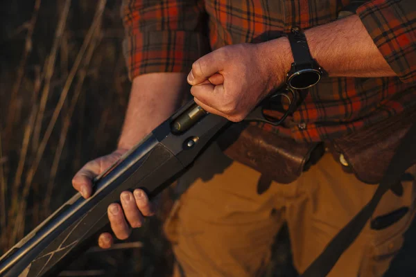 Hunter Hands Loading Gun Cartridge Man Wears Checkered Shirt Camel — Stock Photo, Image