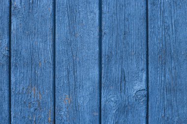 Soyulmuş grunge yüzeyli dikey tahtalardan yapılmış mavi ahşap arkaplan 