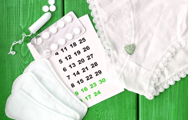 O calendário e coisas menstruação — Fotografia de Stock