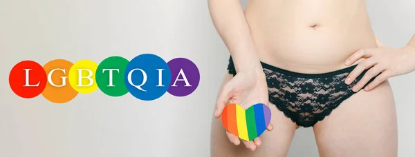 Žena v černém prádle s lgbt symbolem, gay emblém — Stock fotografie