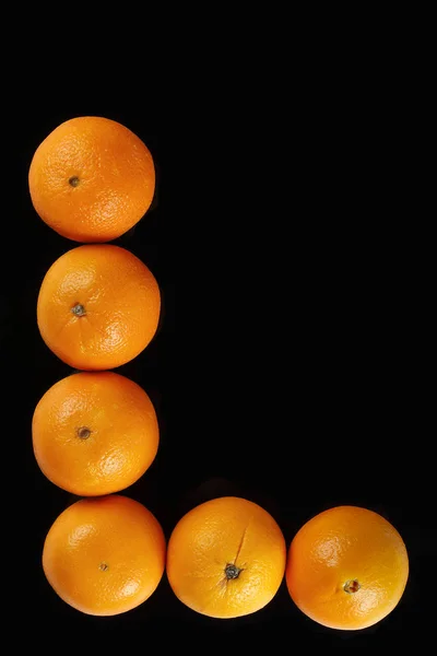 Laranja Fruta vista superior fundo preto — Fotografia de Stock