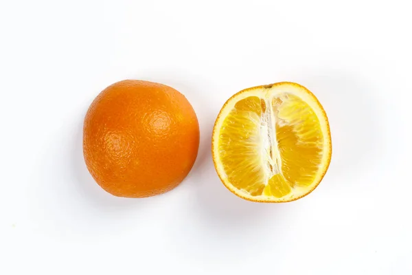 Orange Fruit half cut slices top view white background — 스톡 사진