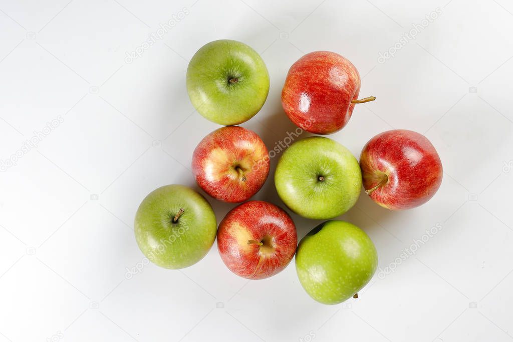 red green apple on white background 