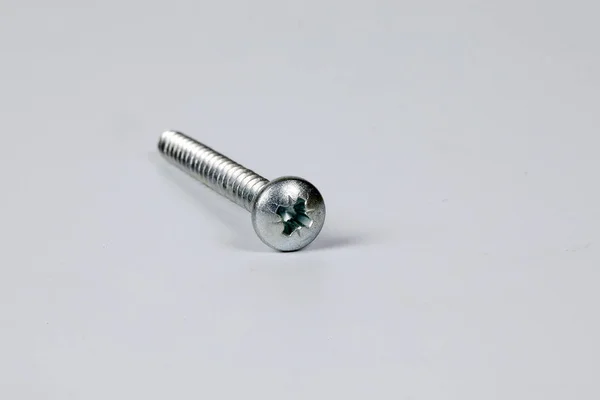 Metal screw plug on white background — Stock Photo, Image