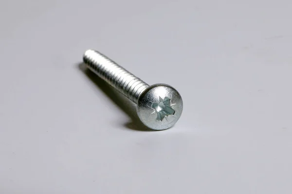 Metal screw plug on white background — Stock Photo, Image