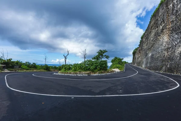 Sharp road curve in high mountains