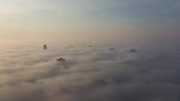 Panoramic view of the metropolis with apartments, buildings and streets smoggy at sunset. Aerial view. Air pollution in the city. Outskirts of the capital of Ukraine Kiev — Stock Video