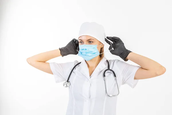 Usando máscara protectora. Médico o enfermera de látex o guantes de goma. Concepto de salud — Foto de Stock