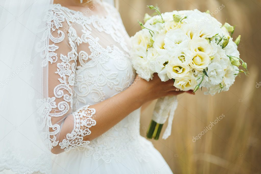 bridal bouquet on the background of spikelets