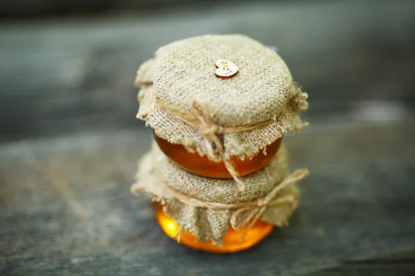 Jars of honey in eco-style