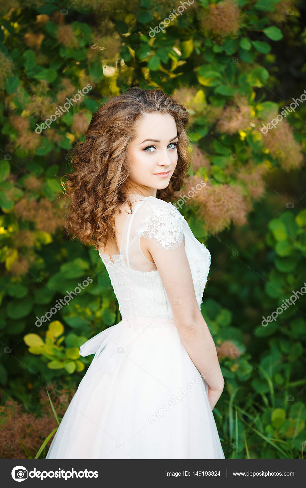 Curly Haired Girl Dressed In White Gown Stock Photo C Y
