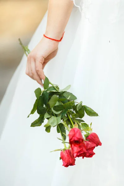 Sweet Wedding Bouquet in the Hands of the Bride — Stock Photo, Image