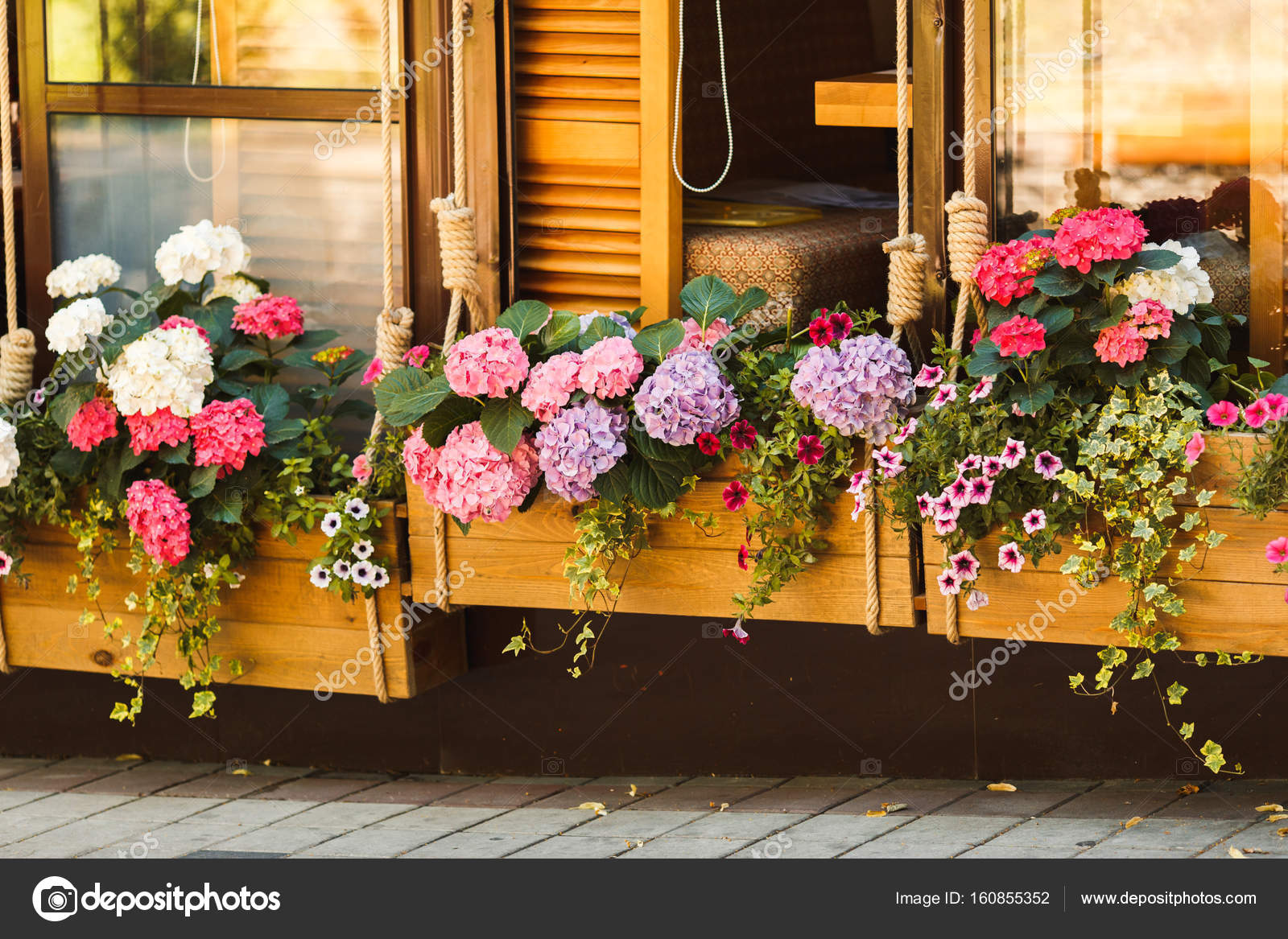 Flowerpot With Flowers In Outdoor Cafe Stock Photo C Y