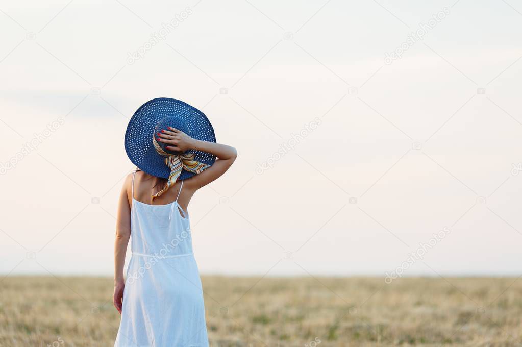 Trip of free girl in blue hat.