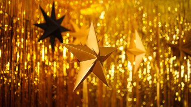 Beş köşeli altın parlayan yıldız