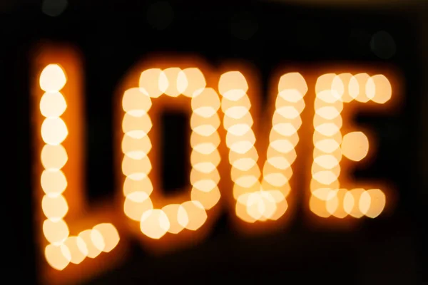 Letras brillantes Amor hecho de bombillas — Foto de Stock