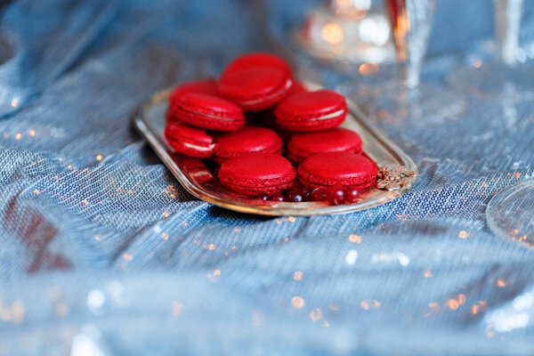 Red berry macaroons in a beautiful tray