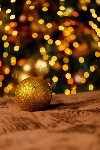 Golden Christmas Balls From A Christmas Tree Branch