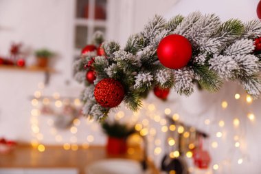 Kitchen decorated for Christmas in red colour