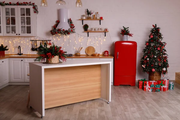 Kitchen decorated for Christmas in red colour