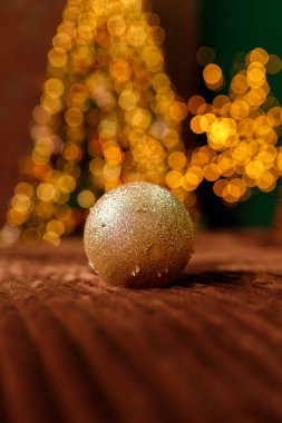 Golden Christmas Balls From A Christmas Tree Branch