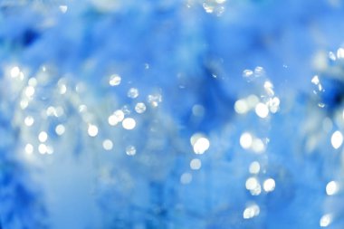 Odaklanmamış Noel süslemeleri ve bulanık Noel ışıkları