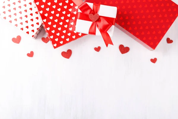 Red and white gift boxes with hearts — 스톡 사진