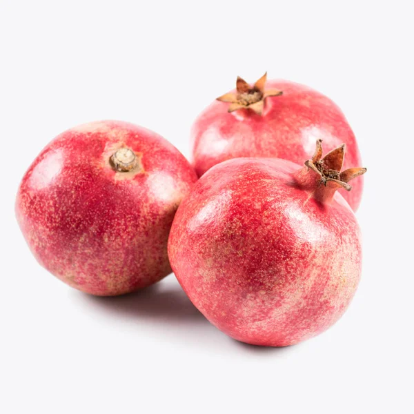 Three pomegranates isolated on white background — Stock Photo, Image