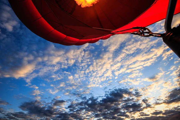 Fire inside a red air balloon