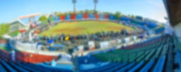 An open-air stadium, summer, green grass, blurred — Stock Photo, Image