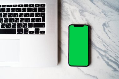 iPhone 10 x ve macbook illustrativeeditorial