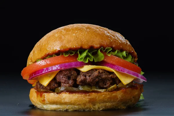 Burger on black background closeup — Stock Photo, Image