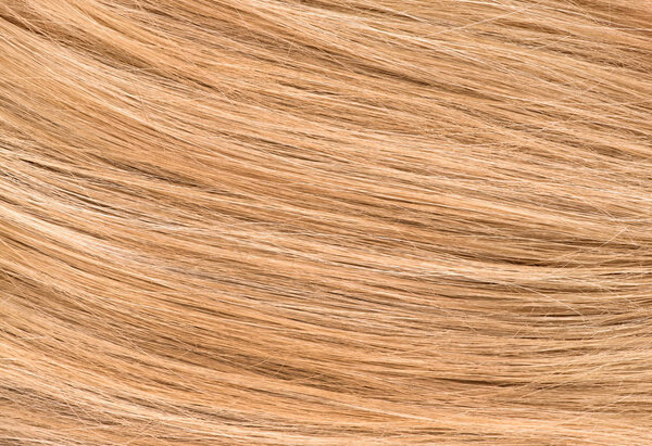 Women's natural blonde hair background