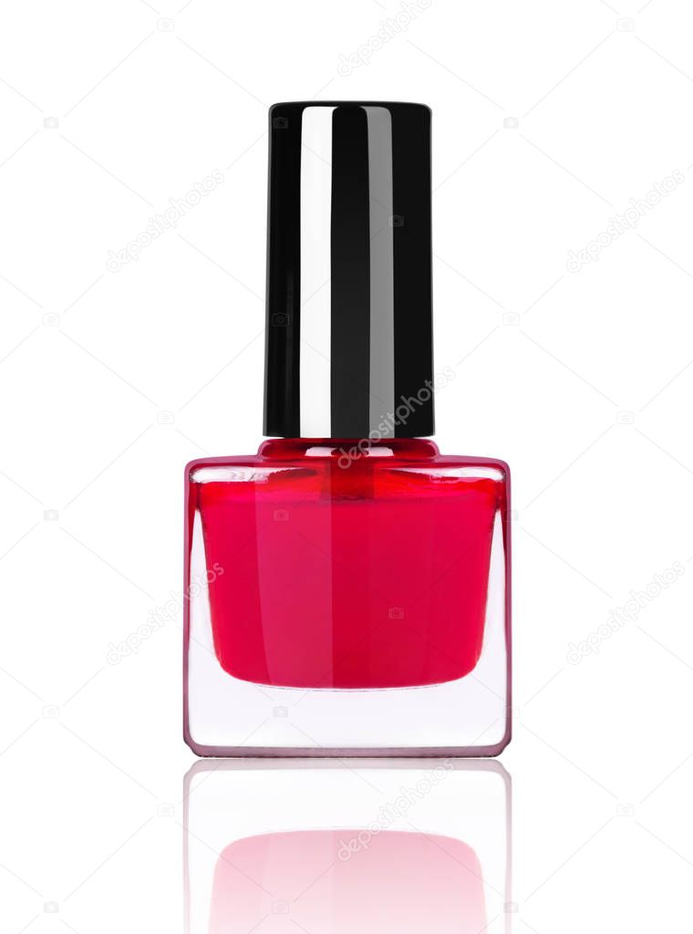 bright red nail polish bottle on white background