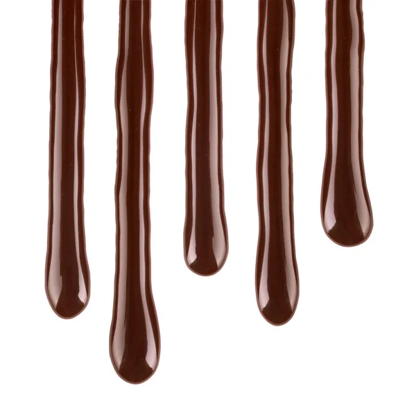 Gotas de chocolate derretido closeup no fundo branco — Fotografia de Stock