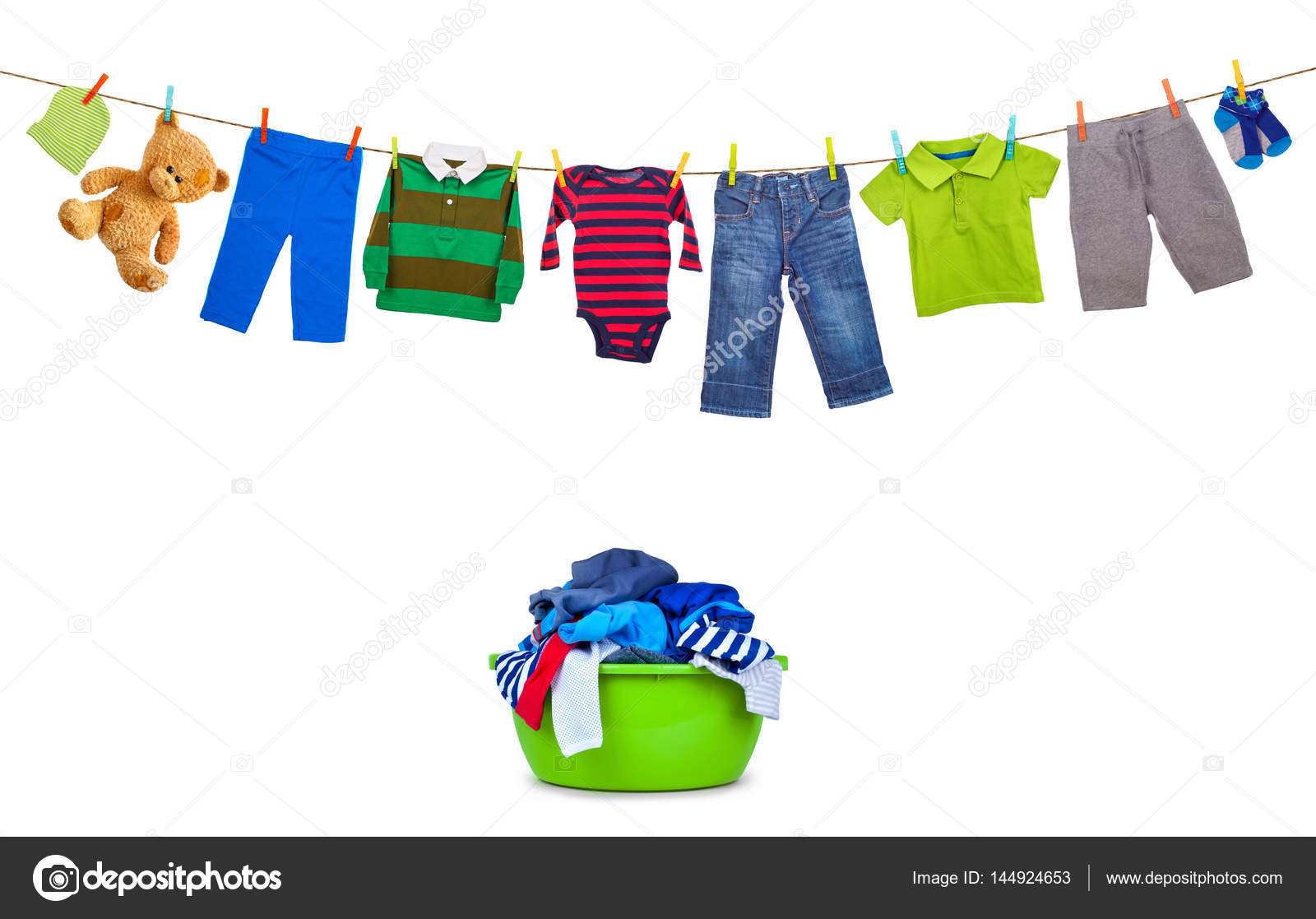 Laundry line with colorful clothes and plastic wash bowl with cl