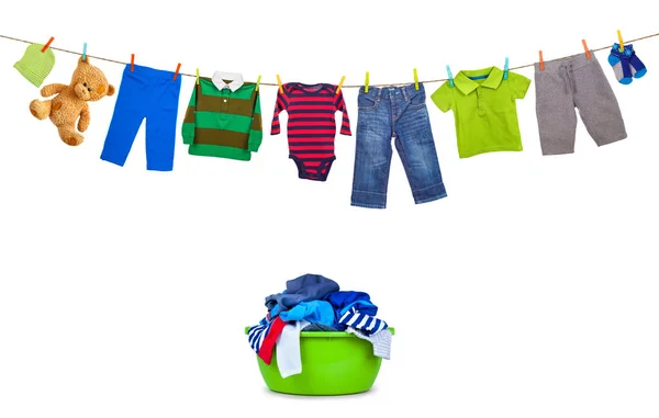 Laundry line with colorful clothes and plastic wash bowl with cl — Stock Photo, Image