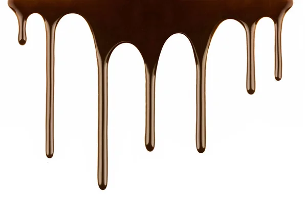 Chocolate derretido gotejamento no fundo branco — Fotografia de Stock