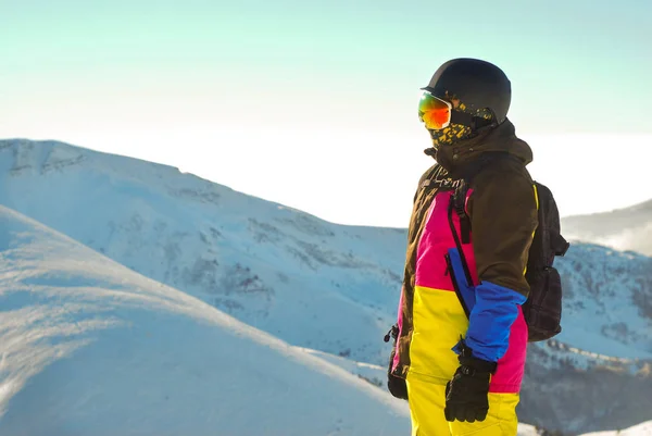 stock image snowboarder standing on the top of mountain