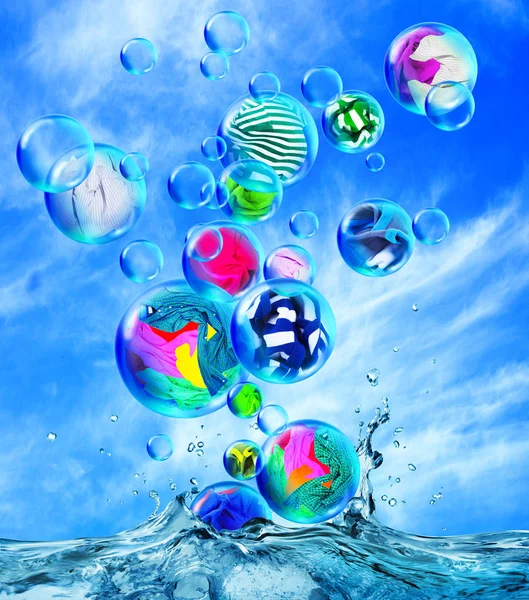 Clean clothes are in soap bubbles fly out of the water