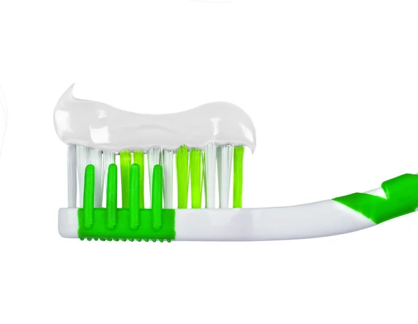 Dentifrice blanc sur une brosse à dents gros plan — Photo