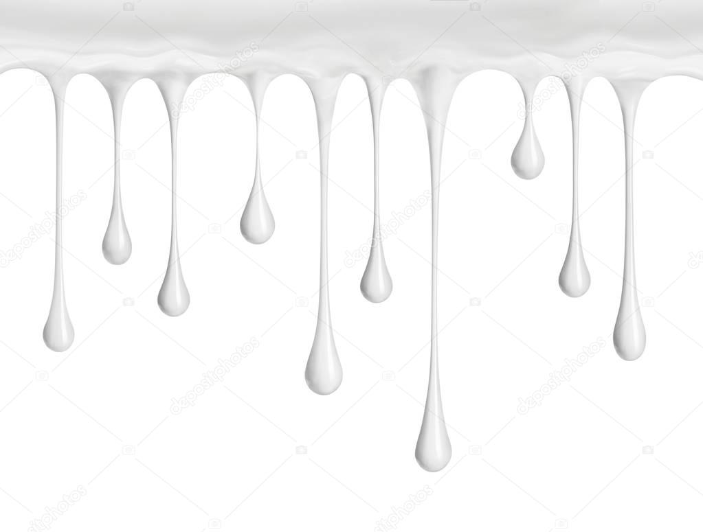 White cream or milk drops drip down