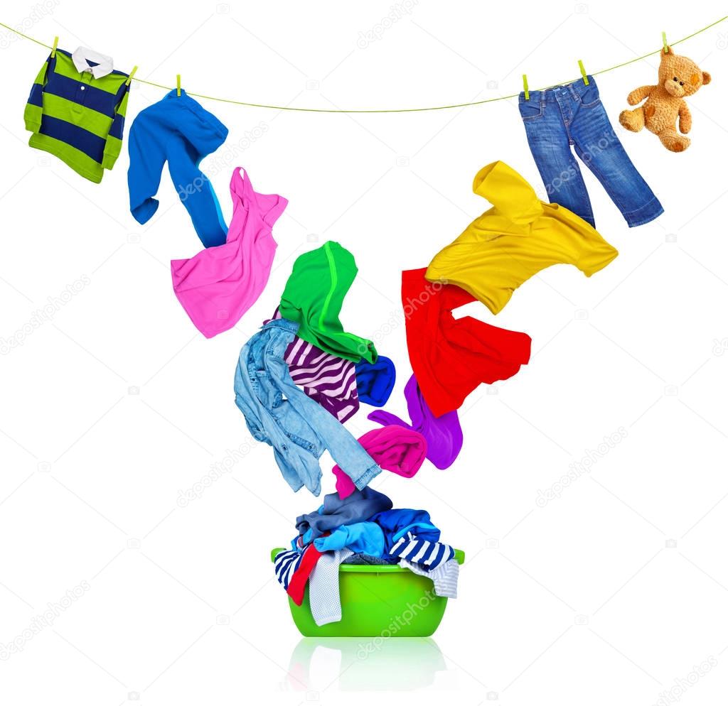 Colorful clothing flies out of the laundry bowl