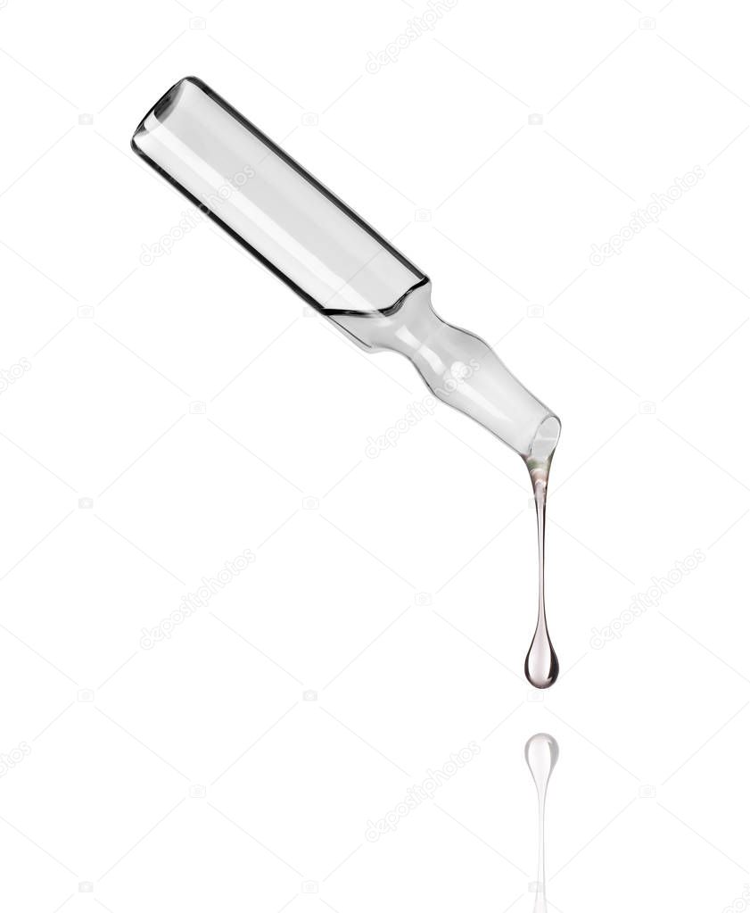 Cosmetic or medical ampoule with falling drop down on white 