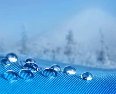 Waterproof fabric with waterdrops close up  clipart